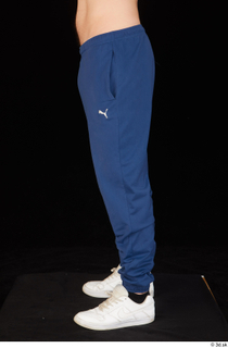 Hamza blue jogging pants leg lower body white sneakers 0003.jpg